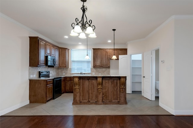 kitchen featuring ornamental molding, light wood-type flooring, black range with electric stovetop, and backsplash