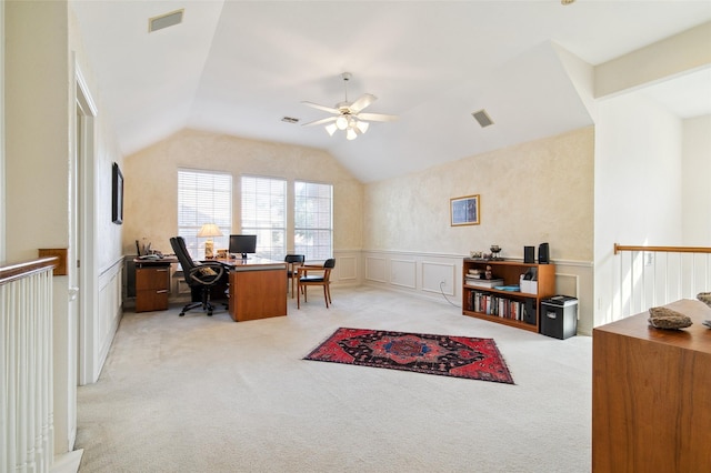 office with lofted ceiling, light colored carpet, and visible vents