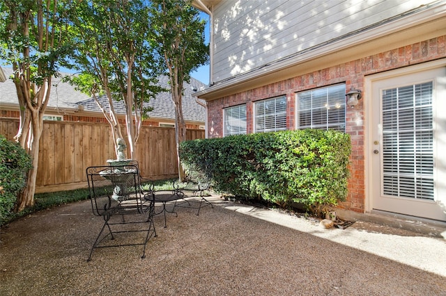 view of patio with fence