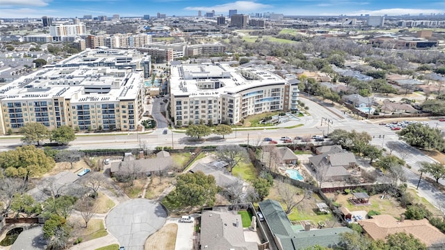 birds eye view of property with a view of city