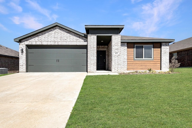 view of front facade featuring central AC unit, concrete driveway, an attached garage, a front lawn, and brick siding