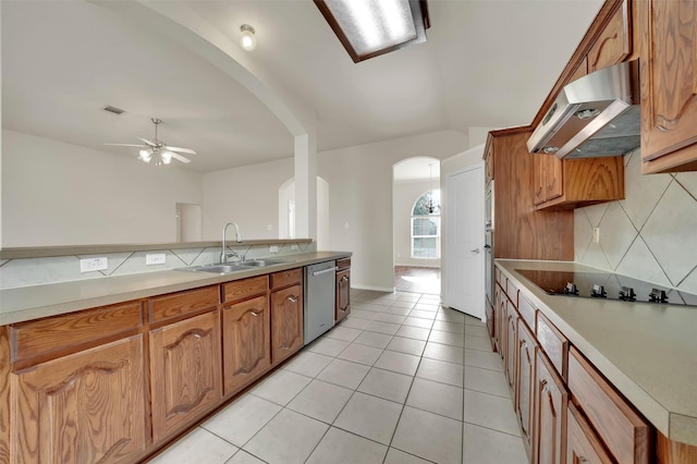 kitchen with decorative backsplash, black electric stovetop, stainless steel dishwasher, under cabinet range hood, and a sink