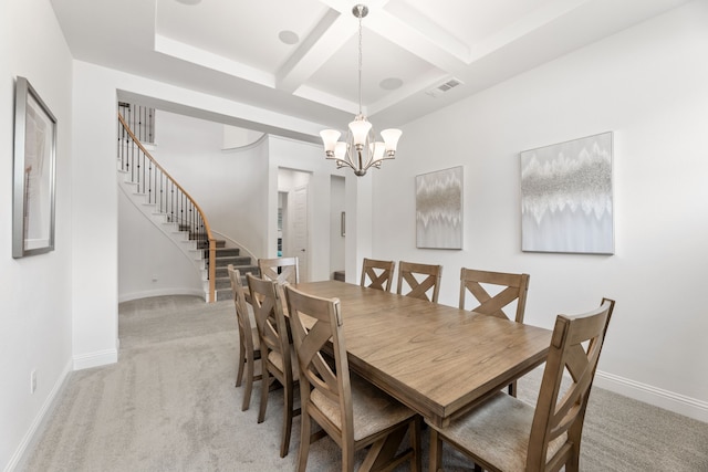 dining space featuring beam ceiling, coffered ceiling, stairs, and light carpet