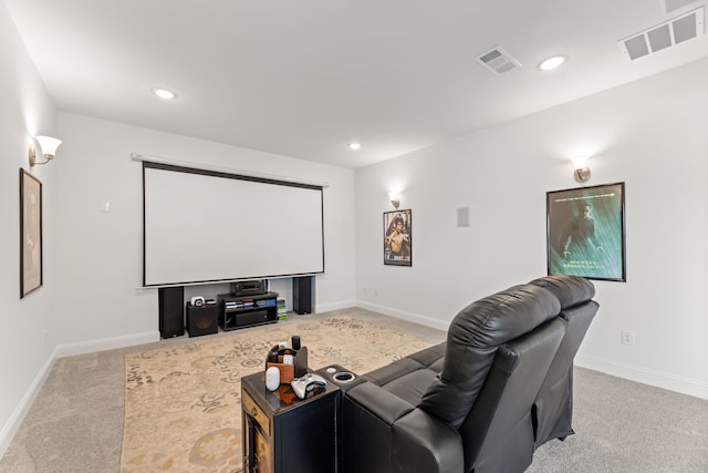 home theater room with recessed lighting, baseboards, visible vents, and light colored carpet