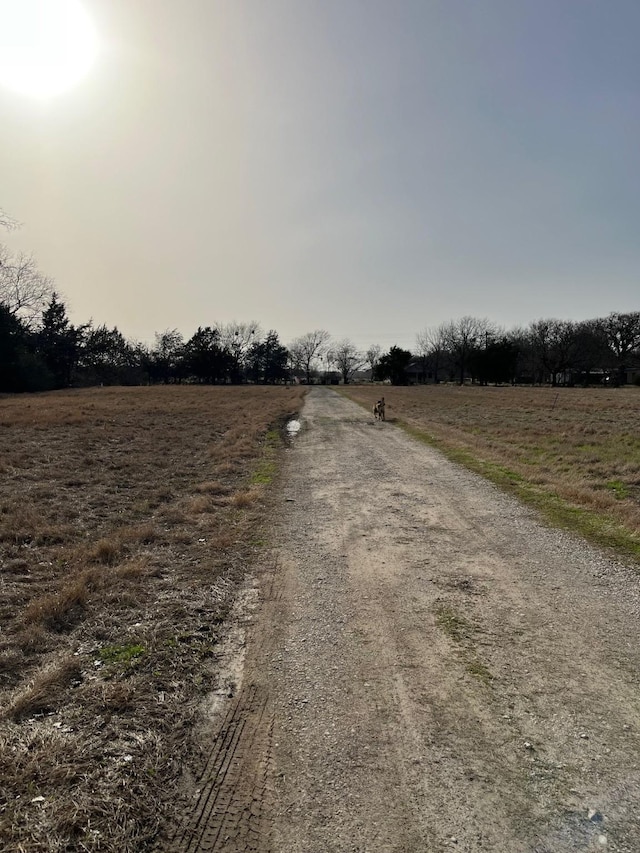 view of street featuring a rural view