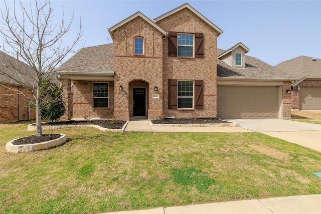 traditional-style house with brick siding, driveway, and a front lawn