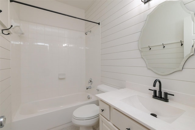 full bath with shower / tub combination, vanity, and toilet