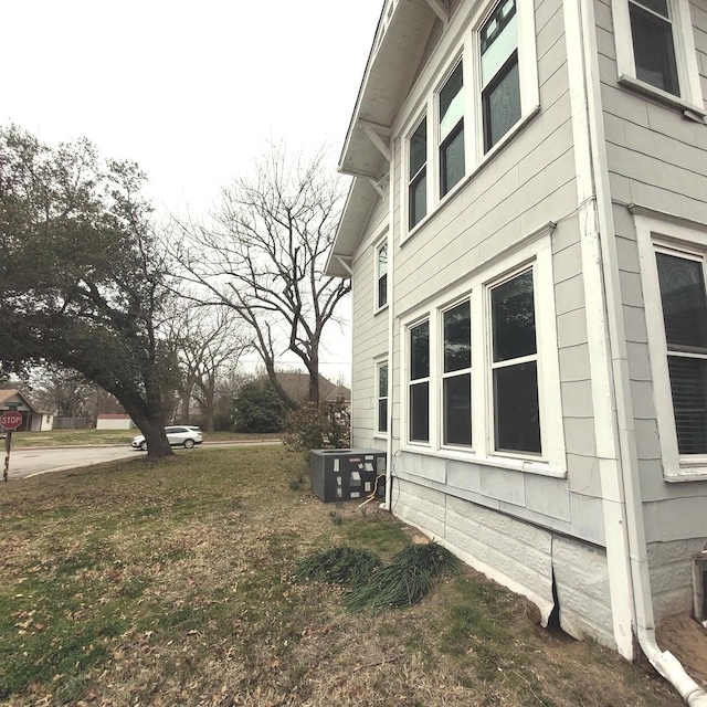 view of home's exterior featuring cooling unit