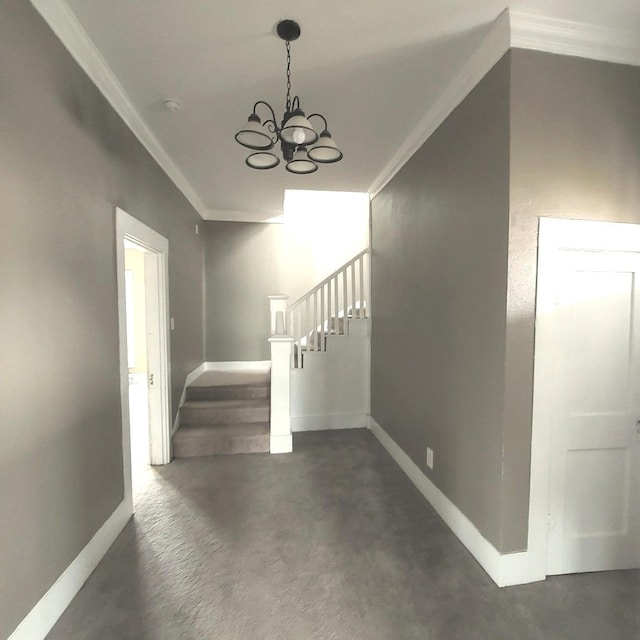 interior space featuring a chandelier, crown molding, stairway, and baseboards