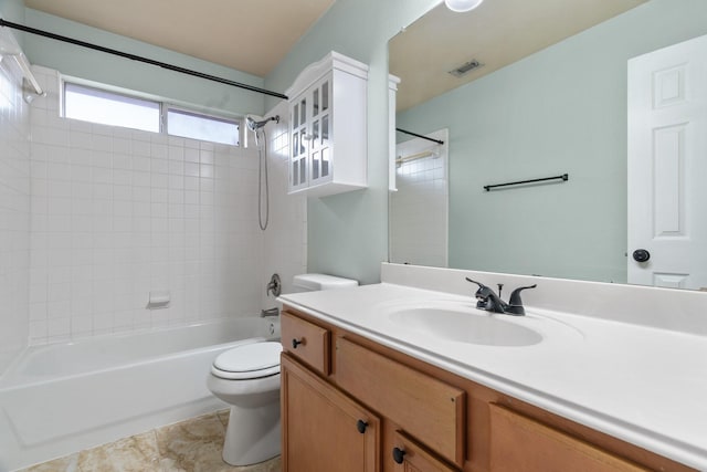 bathroom featuring visible vents, toilet, shower / bathtub combination, tile patterned flooring, and vanity