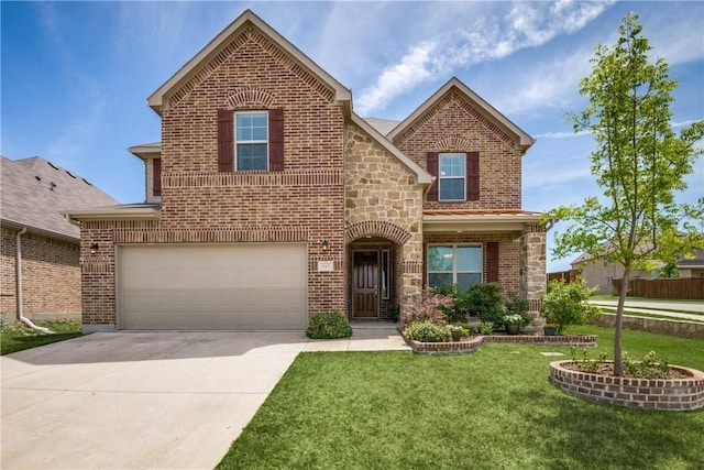 traditional home with stone siding, a front yard, concrete driveway, and brick siding