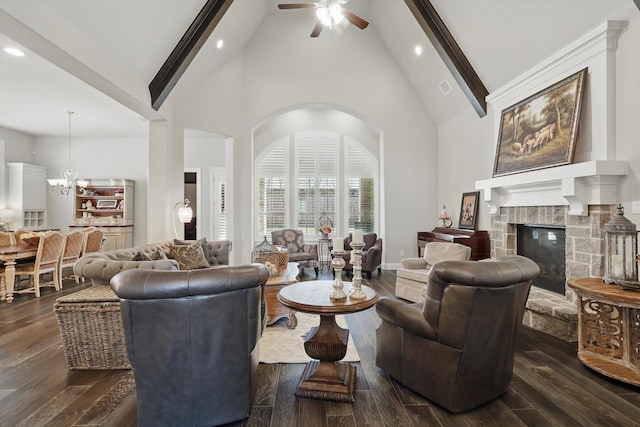 living area with high vaulted ceiling, dark wood-type flooring, a fireplace, and beam ceiling