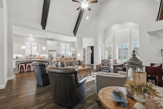 living area with dark wood-style floors, recessed lighting, ceiling fan, high vaulted ceiling, and beamed ceiling