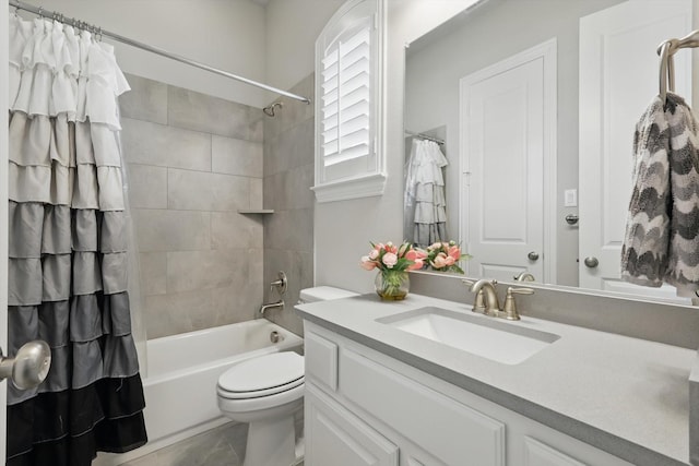 full bathroom with shower / bath combination with curtain, vanity, and toilet