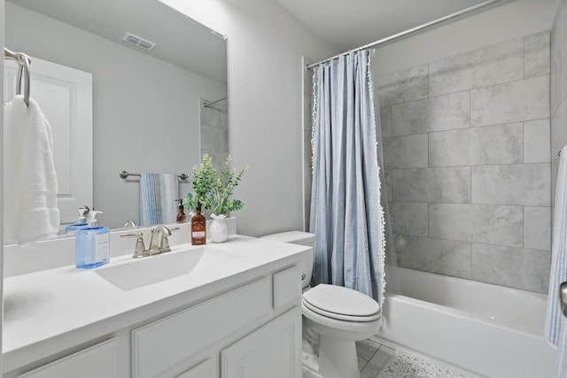 bathroom with visible vents, toilet, shower / bath combo with shower curtain, vanity, and tile patterned flooring