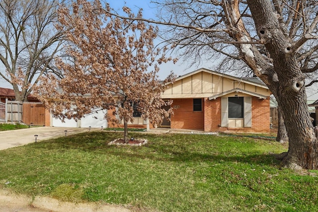 single story home featuring an attached garage, brick siding, fence, driveway, and a front yard