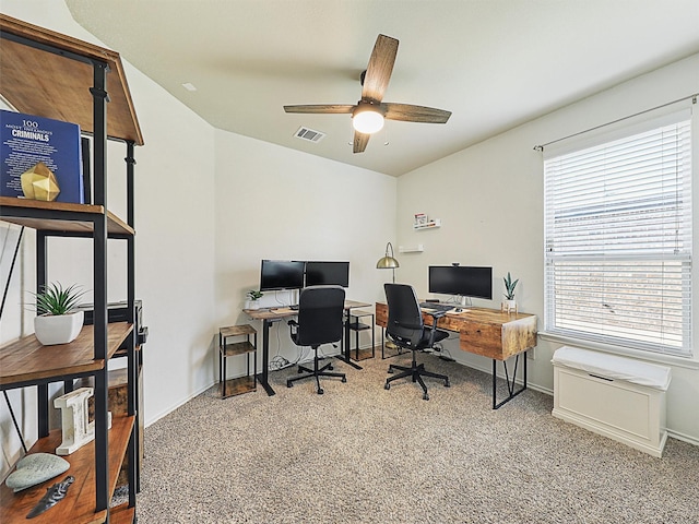 office space featuring visible vents, plenty of natural light, and carpet flooring