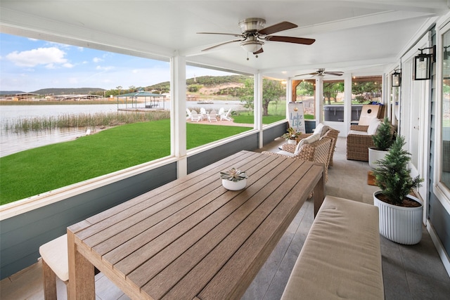 sunroom with a water view