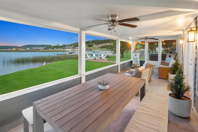 sunroom with a water view