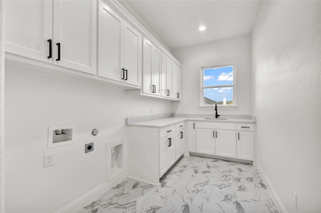 clothes washing area featuring cabinet space, baseboards, marble finish floor, hookup for an electric dryer, and washer hookup