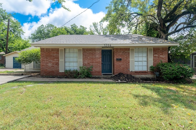 ranch-style house featuring brick siding and a front yard