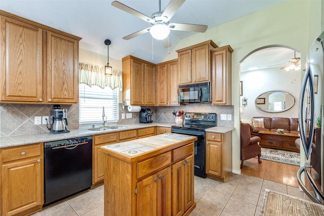 kitchen with arched walkways, light tile patterned floors, a sink, ceiling fan, and black appliances