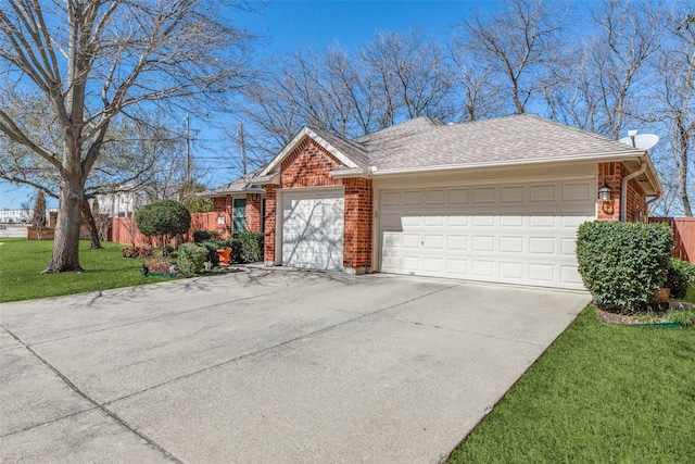 single story home with a garage, a front yard, concrete driveway, and brick siding