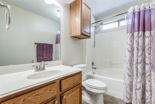 bathroom with shower / tub combo, a textured wall, toilet, tile patterned flooring, and vanity