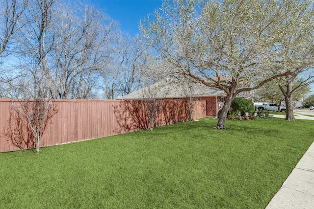 view of yard featuring fence