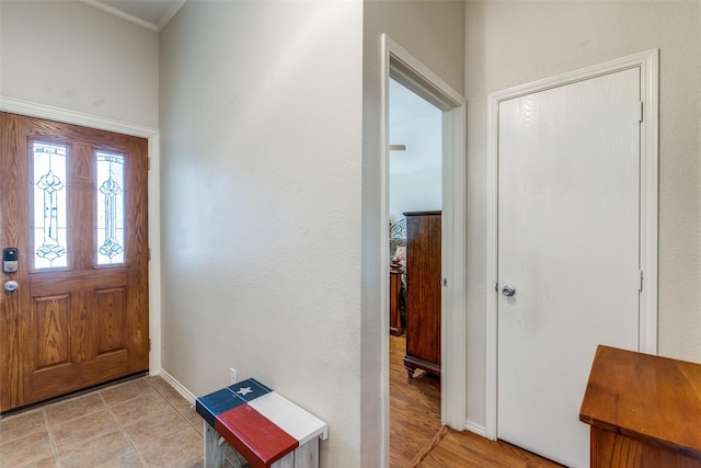 foyer entrance with baseboards