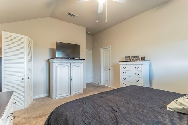 bedroom with visible vents, baseboards, light colored carpet, lofted ceiling, and ceiling fan