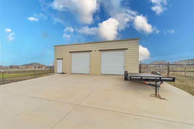 detached garage with fence