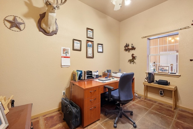 office featuring ceiling fan, tile patterned flooring, and baseboards