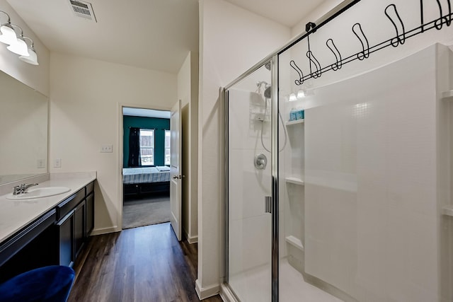 full bath featuring a shower stall, visible vents, and ensuite bathroom