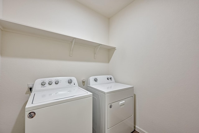 laundry room featuring laundry area and washing machine and dryer