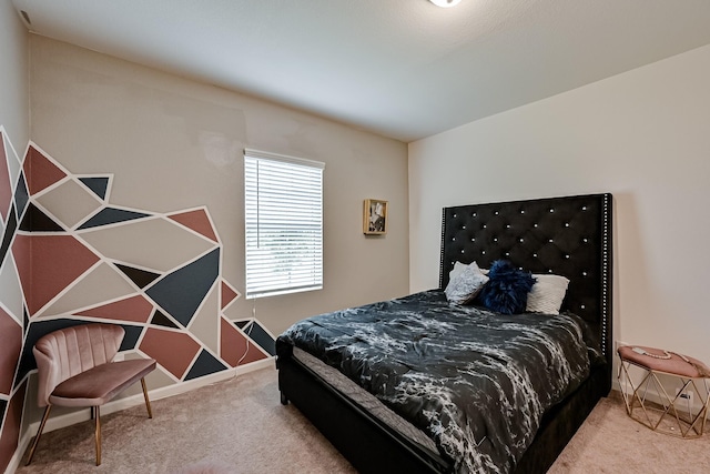 carpeted bedroom with baseboards