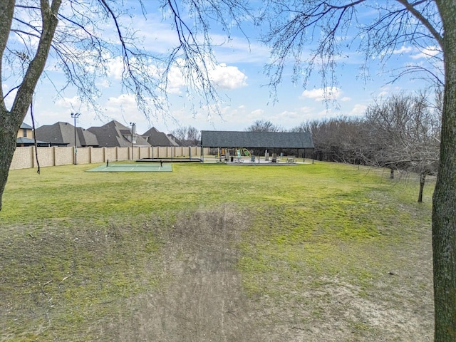 view of yard with a fenced backyard and a patio