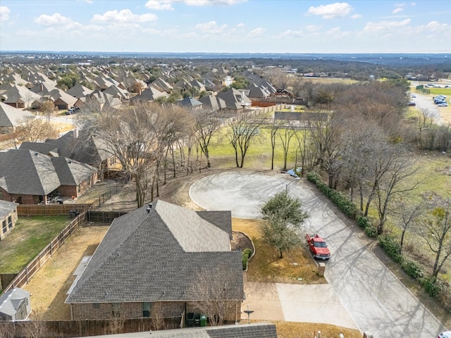 birds eye view of property with a residential view