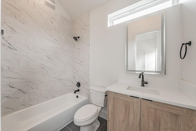 bathroom with  shower combination, vaulted ceiling, vanity, and toilet