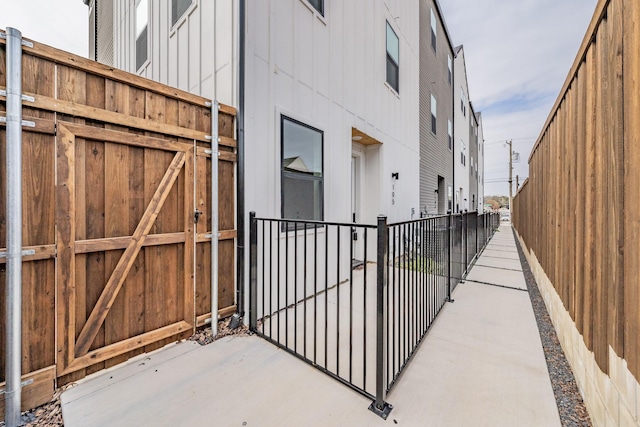 view of gate with fence