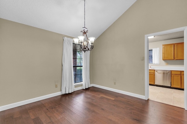 unfurnished dining area featuring light wood finished floors, baseboards, and a wealth of natural light