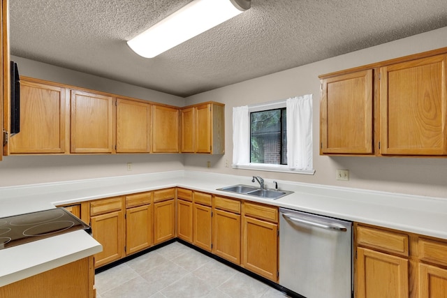 kitchen featuring a sink, a textured ceiling, light countertops, and dishwasher