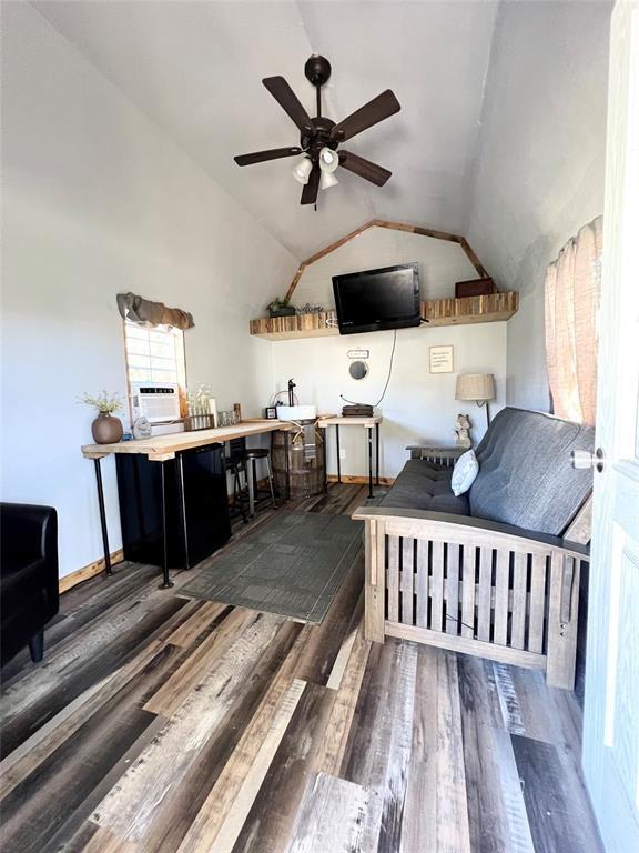12900 Fm 121, Van Alstyne, TX 75495 - living room with ceiling fan, vaulted ceiling, and wood finished floors
