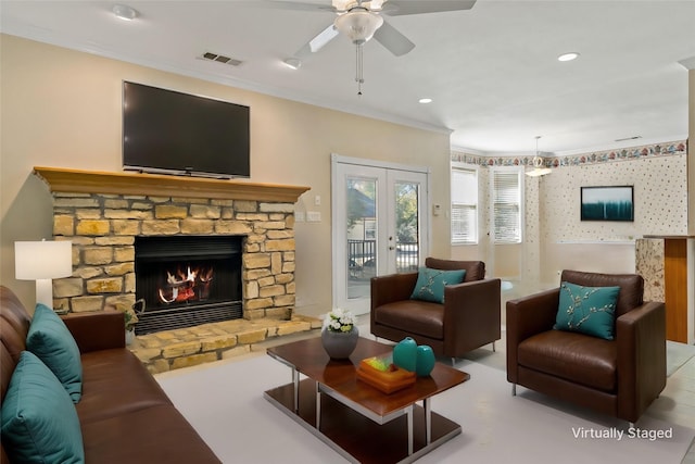 12900 Fm 121, Van Alstyne, TX 75495 - living area featuring visible vents, french doors, ornamental molding, a stone fireplace, and recessed lighting