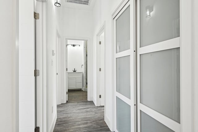 hallway with dark wood-style floors