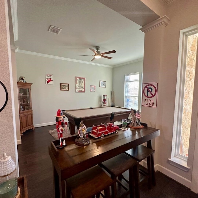 dining space with dark wood-style floors, baseboards, visible vents, and ornamental molding