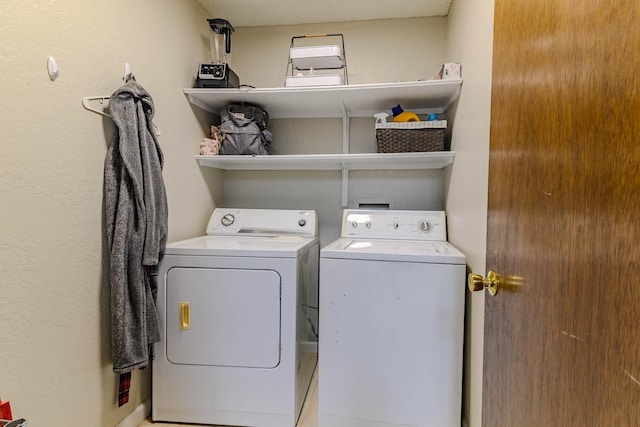 laundry area featuring laundry area and separate washer and dryer