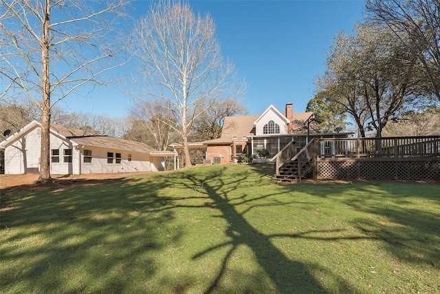 view of yard with a deck