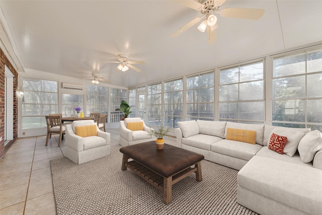 sunroom / solarium featuring a wall unit AC and ceiling fan