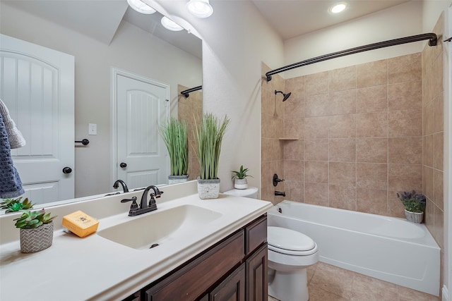 bathroom with tile patterned flooring, shower / bathing tub combination, vanity, and toilet